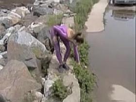 Slender amateur doll is wrapped in lilac latex costume 08e