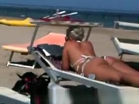 Big ass milf on the beach