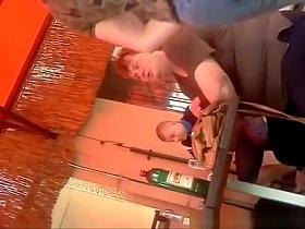 Mature drunk woman showing boobs .