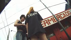 Blonde cutie treats us to an up skirt view of her ass