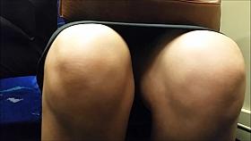 Bare legged upskirt on train