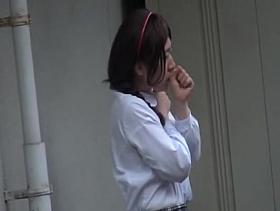 Sharking of a Japanese babe in a white bra and a short skirt