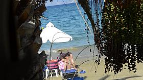 Open legs bikini mature