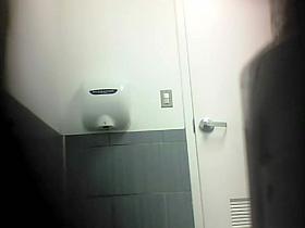 Young hairy pussy spied in toilet