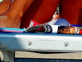 Hot girl spreads her legs in front of me at the beach