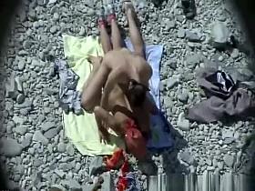 Horny couple in the beach having sex