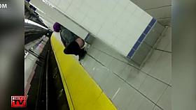 Wicked purple-haired babe makes water at the subway