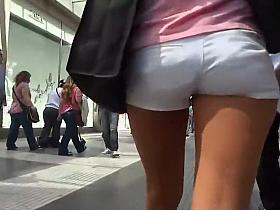 Gorgeous girl in tight white shorts