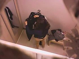 Brunette asian in black thongs changing clothes spy video