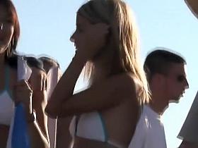 Young hostesses in matching hot pants