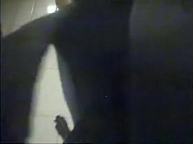 Couple changing in pool cabin