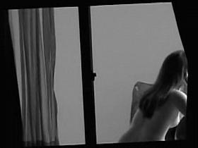 Sexy neighbor getting naked in the open window