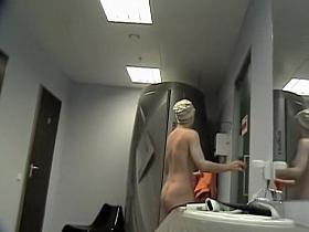 Girl in changing room spied naked in front of the mirror