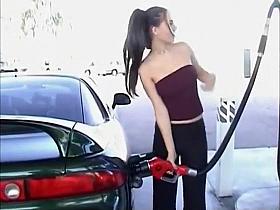 Pretty lady exposes her boobies at the gas station