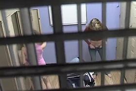 A couple of hot babes are in a dressing room trying on clot