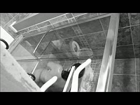 Peeping on MILF showering