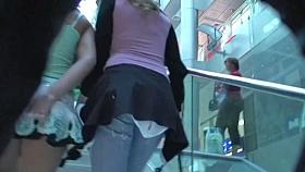 Gorgeous brunette gives amazing upskirt view while climbing