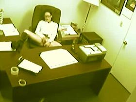 Lady boss stretches legs and masturbates in the xxx hidden camera