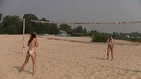 Beautiful fresh faced teen plays at the beach nude