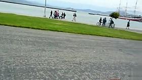 Stroking the pierced penis on the coast