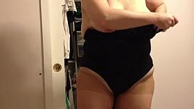 covering her large bazookas & curves with her darksome body stocking