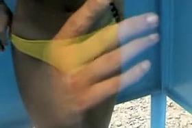 Free beach cabin videos with fems changing to swimsuits