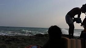 Several sexy nude girls caught on a beach with a spy cam