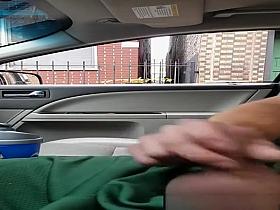 Exhibitionist dude plays with his penis inside car