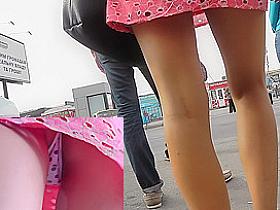 Outstanding upskirt view of two young sexy girlfriends