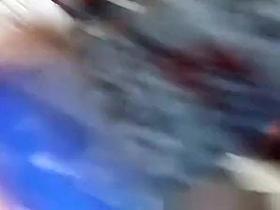 Girl in tight pink shorts and tight gray top