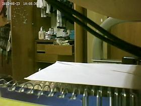 She gets spied putting on panties