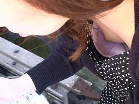 Sweet Asian chick caught by an amateur downblouse voyeur.