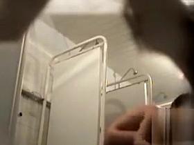 Two seductive coeds enjoy washing their tasty bodies