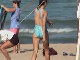 Spy cam on beach shooting candid babe in hot swimsuit 01o
