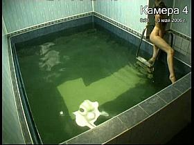 Doll in bikini in pool