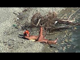 Couple fucking on a public beach, while walking past people