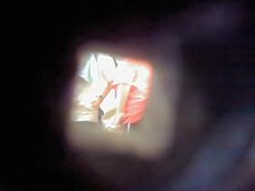 Dressing room spy cam spying fem through the wall hole