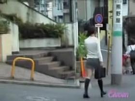 Asian business lady with a briefcase got skirt sharked