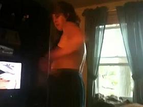 Showing her ass and tits