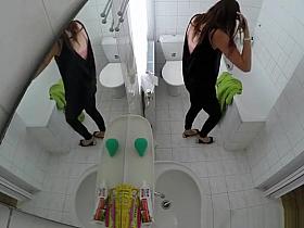 Hot brunette chick with tattoos showering