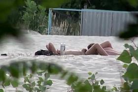 Beach pussy licking spied by a voyeur