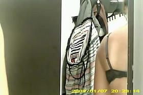 Sweet babe choosing which brassiere to put on today