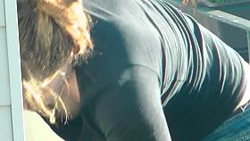 MILF Bends Over To Show Off Her Rack