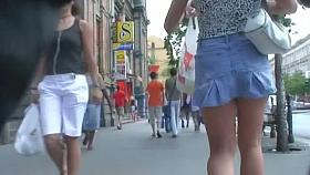 Spy cam porno vid of a brunette babe in a jean skirt walking around