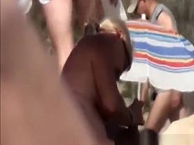 Nudist wives giving their men handjobs