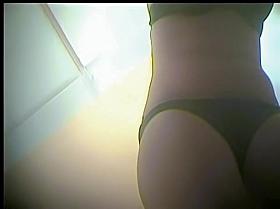 Dressing room amateur changing into her lingerie and cloths