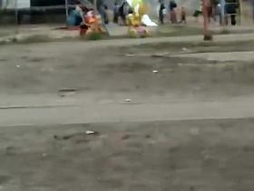 Checking her out while she fixes up