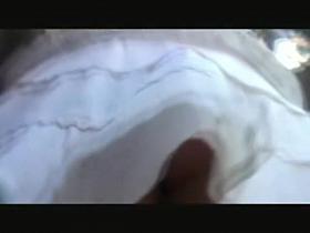 Fresh white thong seen up skirt of babe in the street