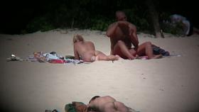 Hot couple caught on a nude beach spy cam vid