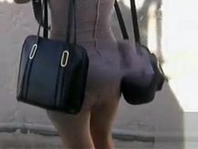 Wind is blowing and uncovering her butt